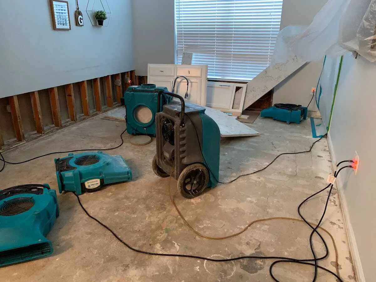 Dehumidifier in flood-cut room for Water Damage Restoration in Unionville